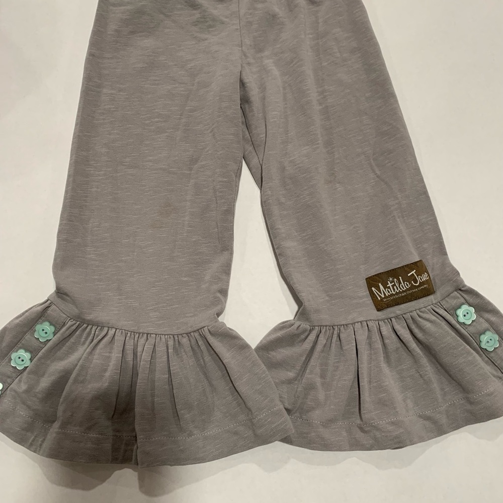 Matilda Jane gray pants with ruffles and pale green buttons on ruffles. Size 4.